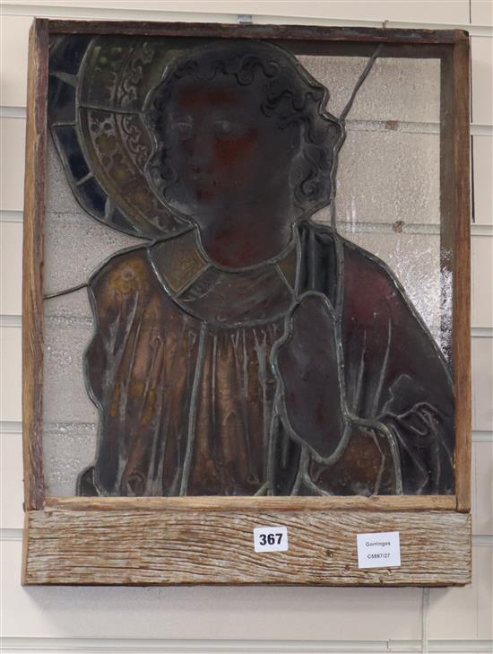 A French oak framed stained glass panel of a saint